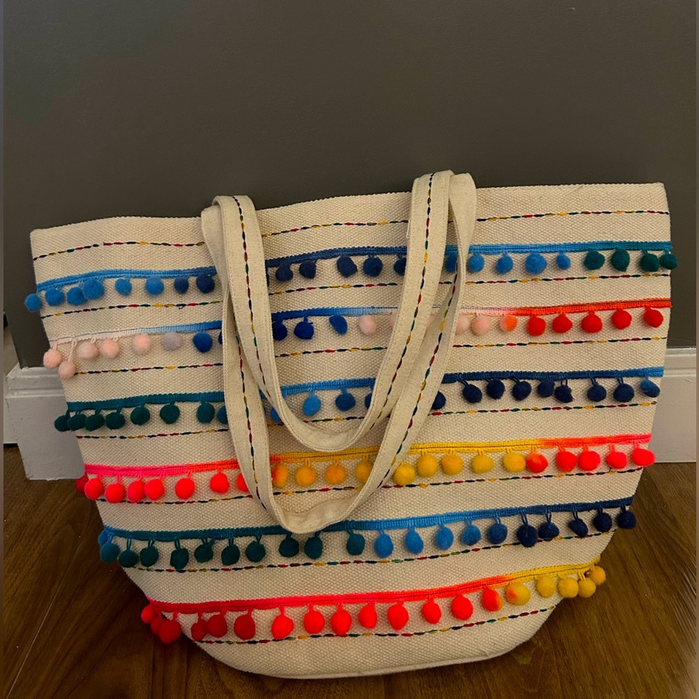 Canvas tote bag with pom poms-perfect for a beach day or tropical vacation!